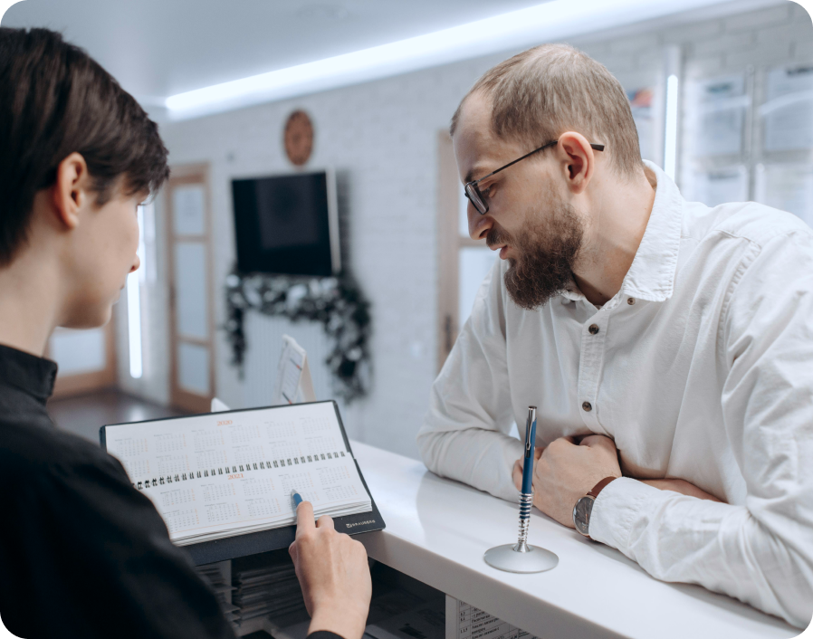 doctor and nurse discussing patient chart